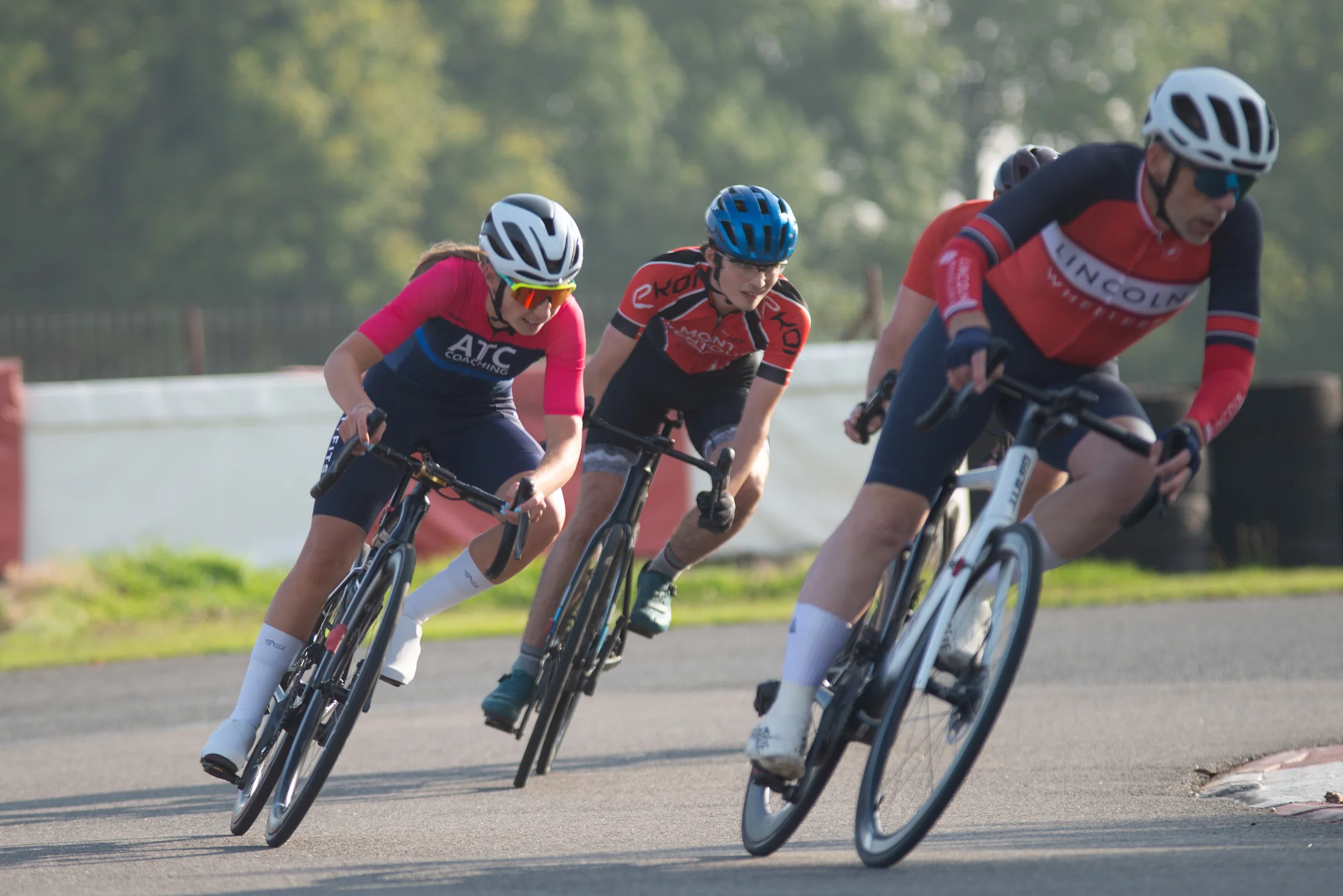 WattFits rider racing in custom team kit